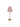 Small lamp with a red and white striped shade on a white background